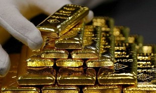 Золото продолжило рост на фоне эскалации торгового конфликта